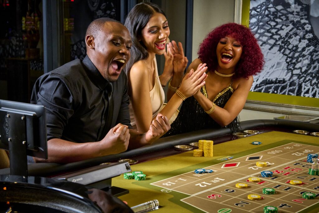 Guests celebrating a roulette win at Metcourt Umfolozi casino